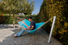 Load image into Gallery viewer, man sitting on the GARD&amp;ROCK - Hammock Post (428-014)
